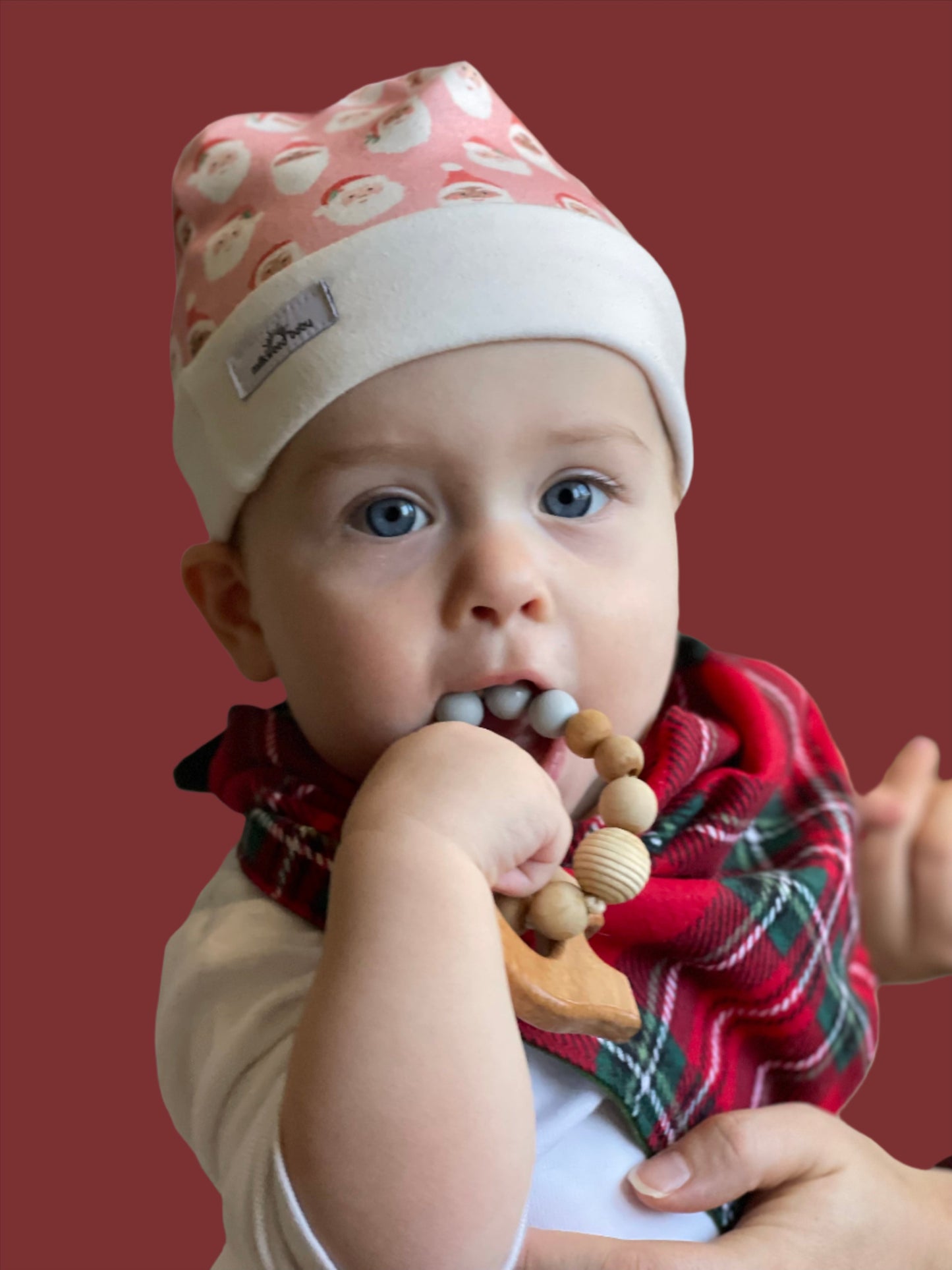 9 month old baby modeling a bib dana