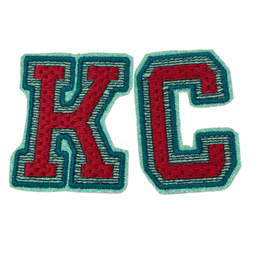 KC iron-on patch with Kansas City Current team colors.