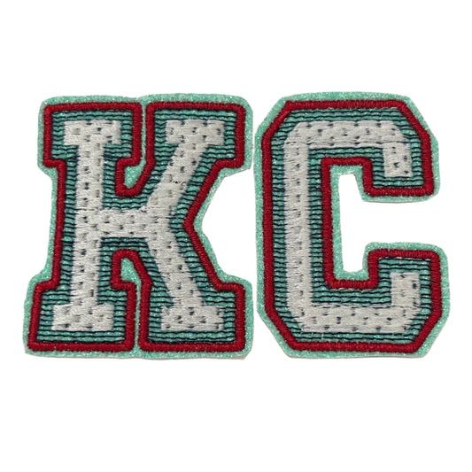 KC iron-on patch with Kansas City Current team colors.