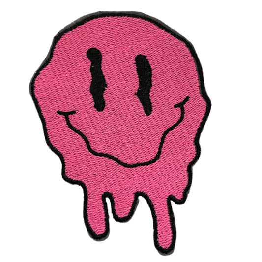 Melting pink smiley face patch with dripping design.