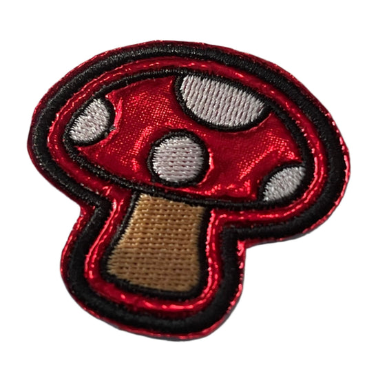 Whimsical red mushroom embroidered patch for custom trucker hats.