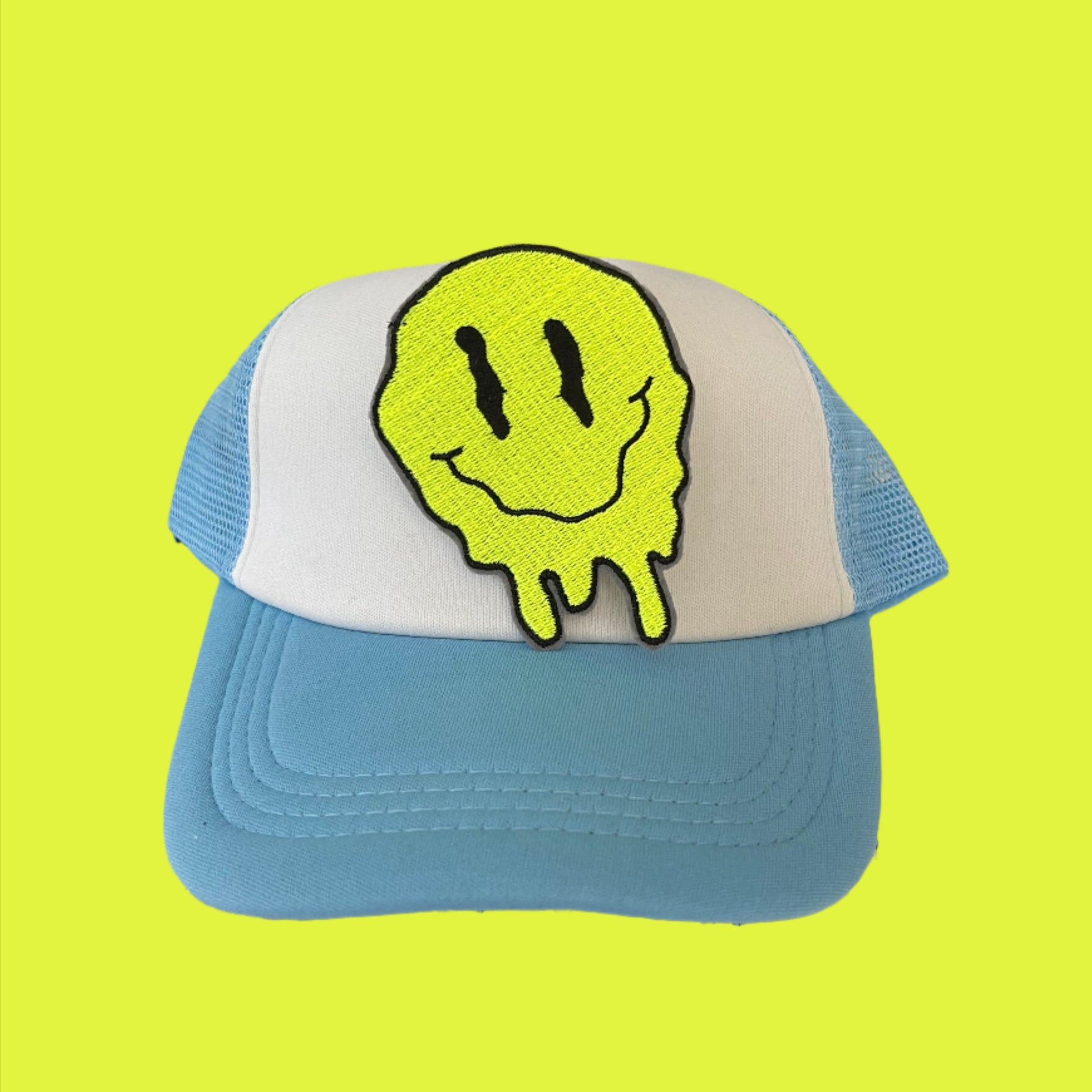 Bright yellow iron-on patch featuring a melting smiley face design, showcasing an edgy and fun retro aesthetic.