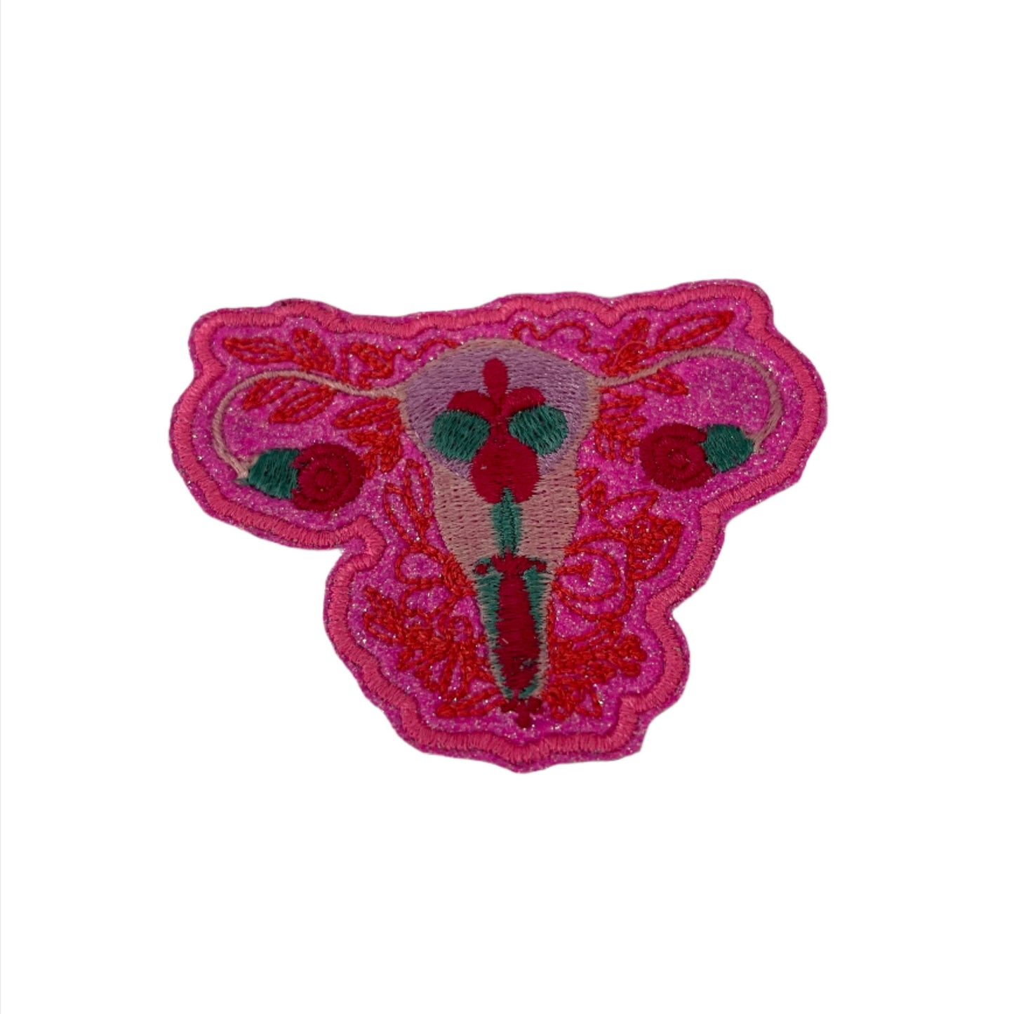 Floral uterus embroidered patch featuring intricate floral designs in vibrant colors, perfect for customizing clothing and accessories.