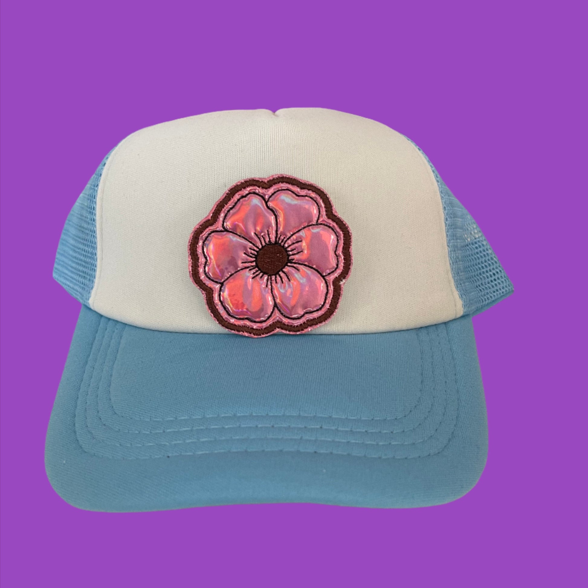 Holographic pink flower patch with bold embroidery, perfect for customizing clothing and accessories.