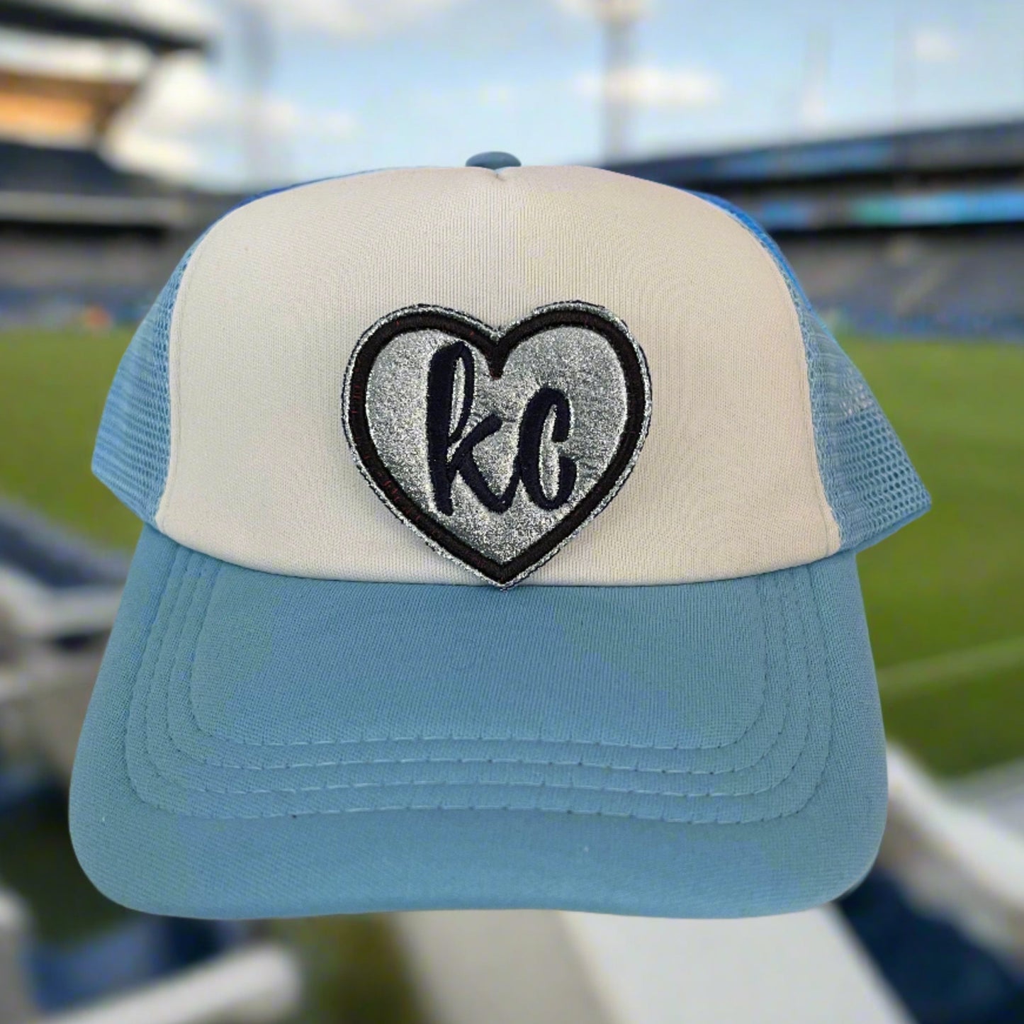 Heart KC iron-on patch in Sporting KC team colors, perfect for adding a touch of local pride to any apparel.