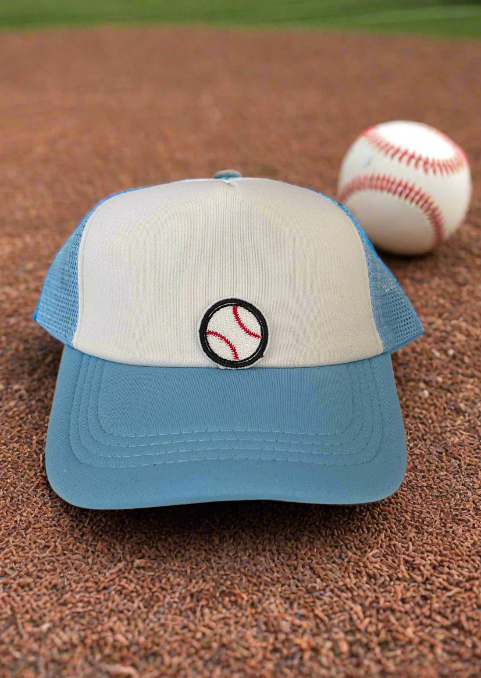 Close-up of a baseball embroidered patch with red stitching, perfect for customizing hats and other accessories.