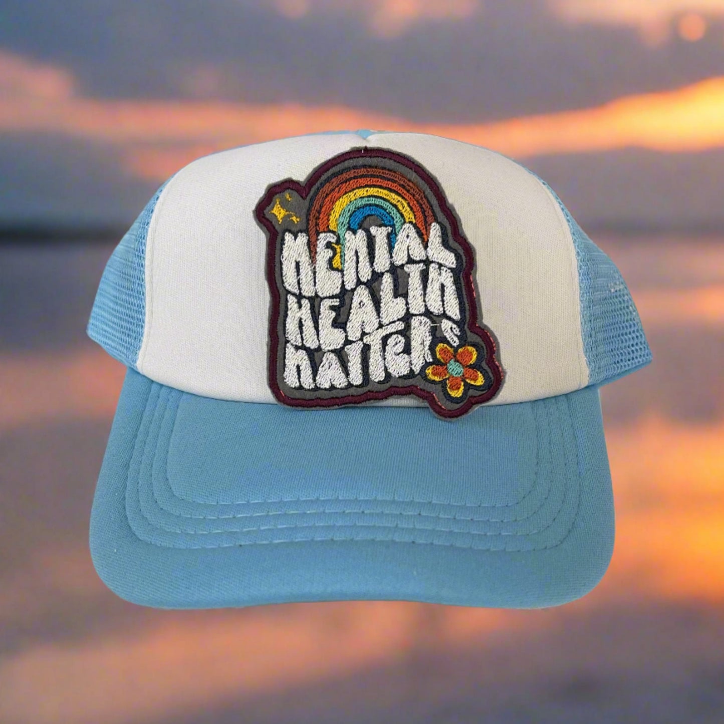 Mental Health Matters embroidered patch featuring a colorful rainbow and whimsical design, perfect for customizing clothing and accessories.