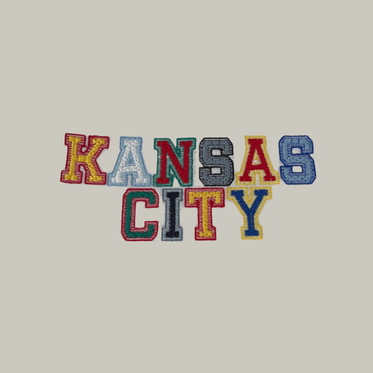 Kansas City patch featuring bold team colors, perfect for customizing clothing and accessories.
