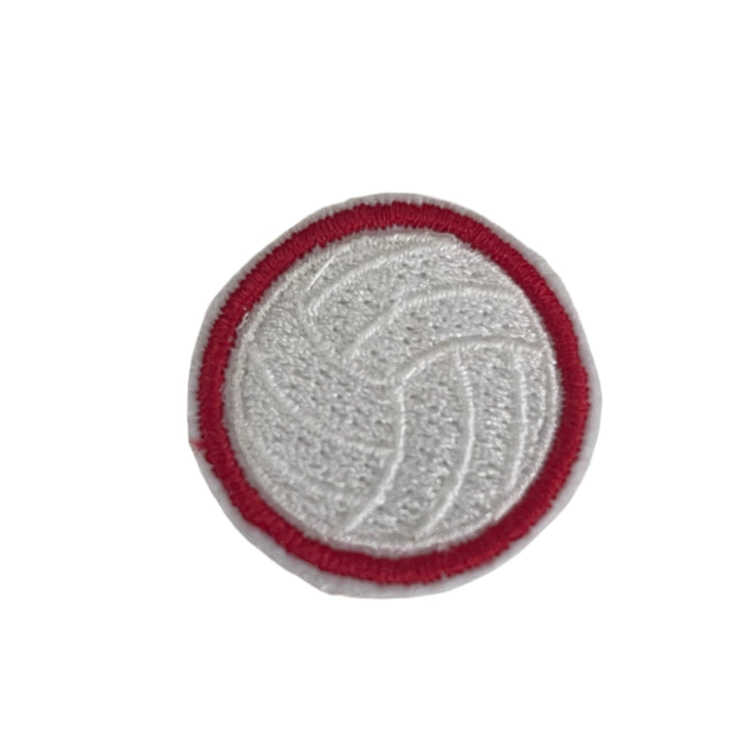 Close-up of a volleyball embroidered patch with white and red detailing, perfect for customizing hats and other accessories.