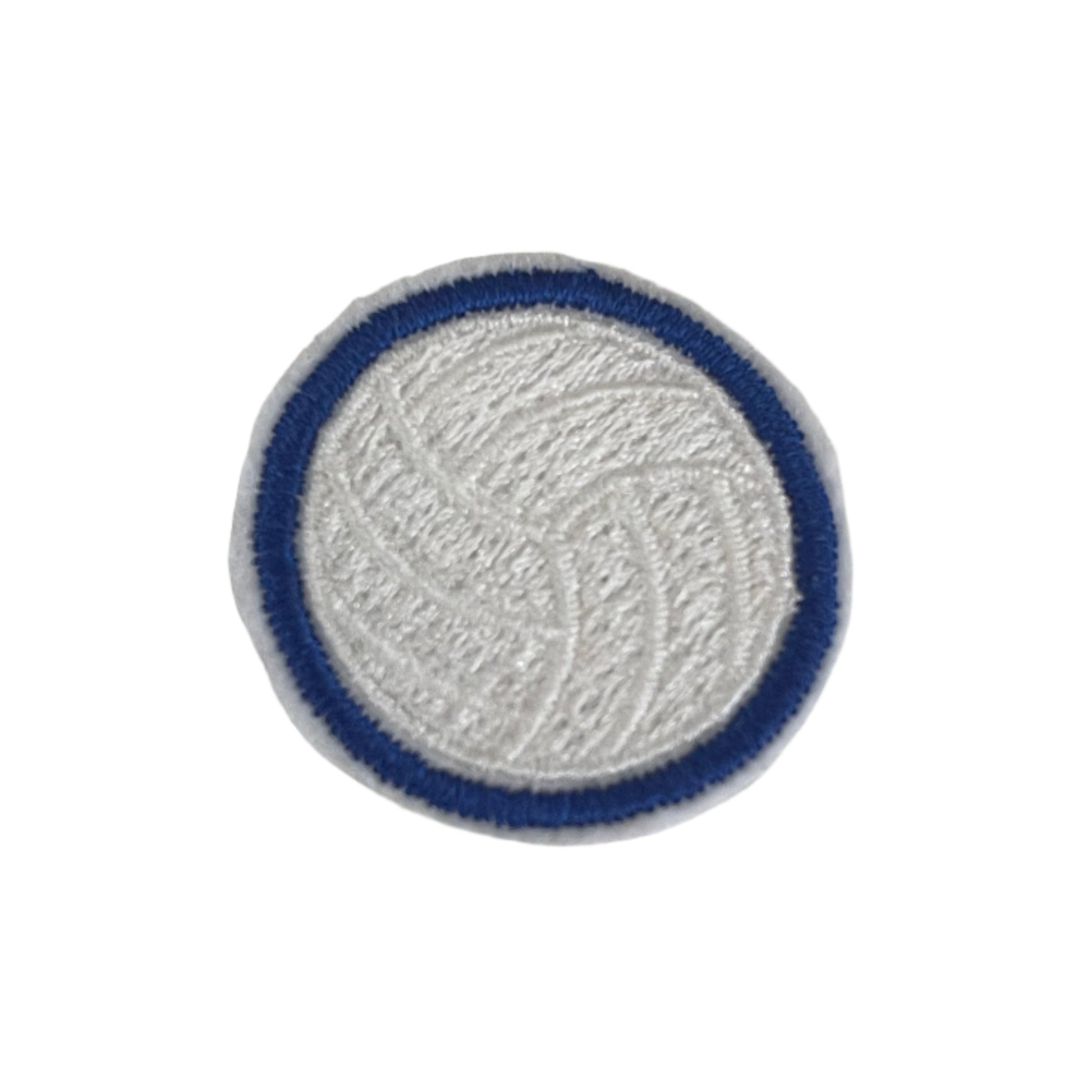 Close-up of a blue volleyball embroidered patch with white and blue detailing, perfect for customizing hats and other accessories.