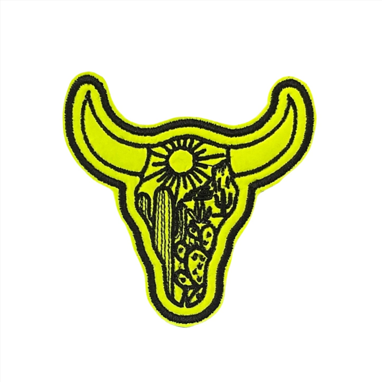 Vibrant yellow bull skull embroidered patch with artistic detailing.