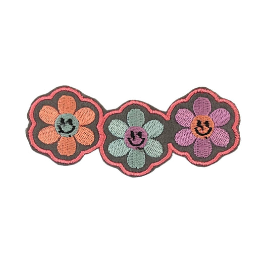 Triple Happy Flower embroidered patch with vibrant colors and smiley faces, perfect for adding a whimsical touch to various accessories.