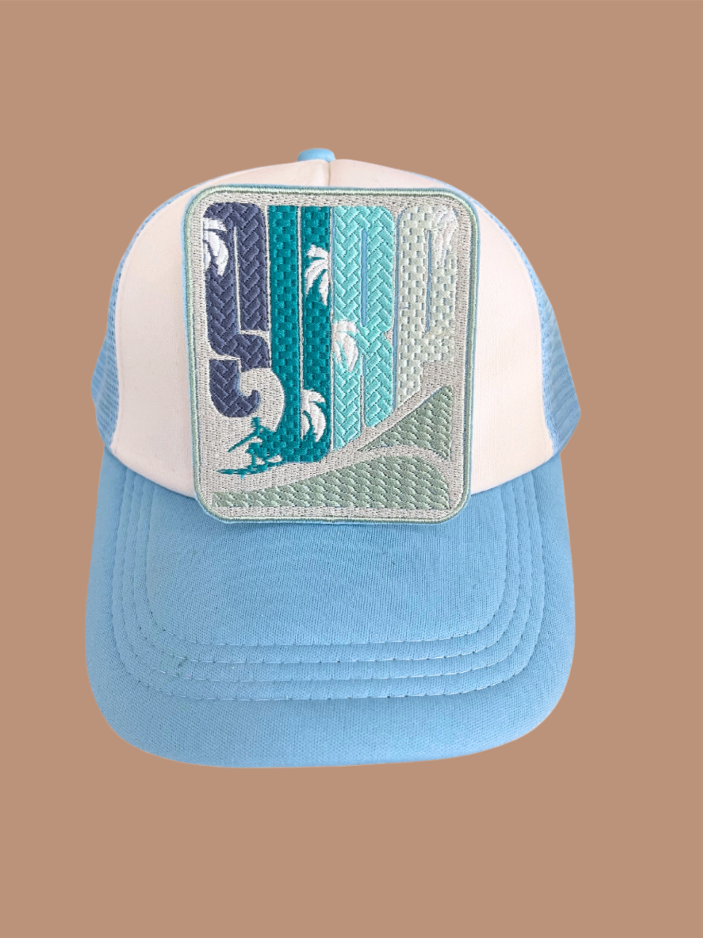 Custom embroidered surf patch featuring a wave design with palm trees, designed for personalization on hats and apparel.