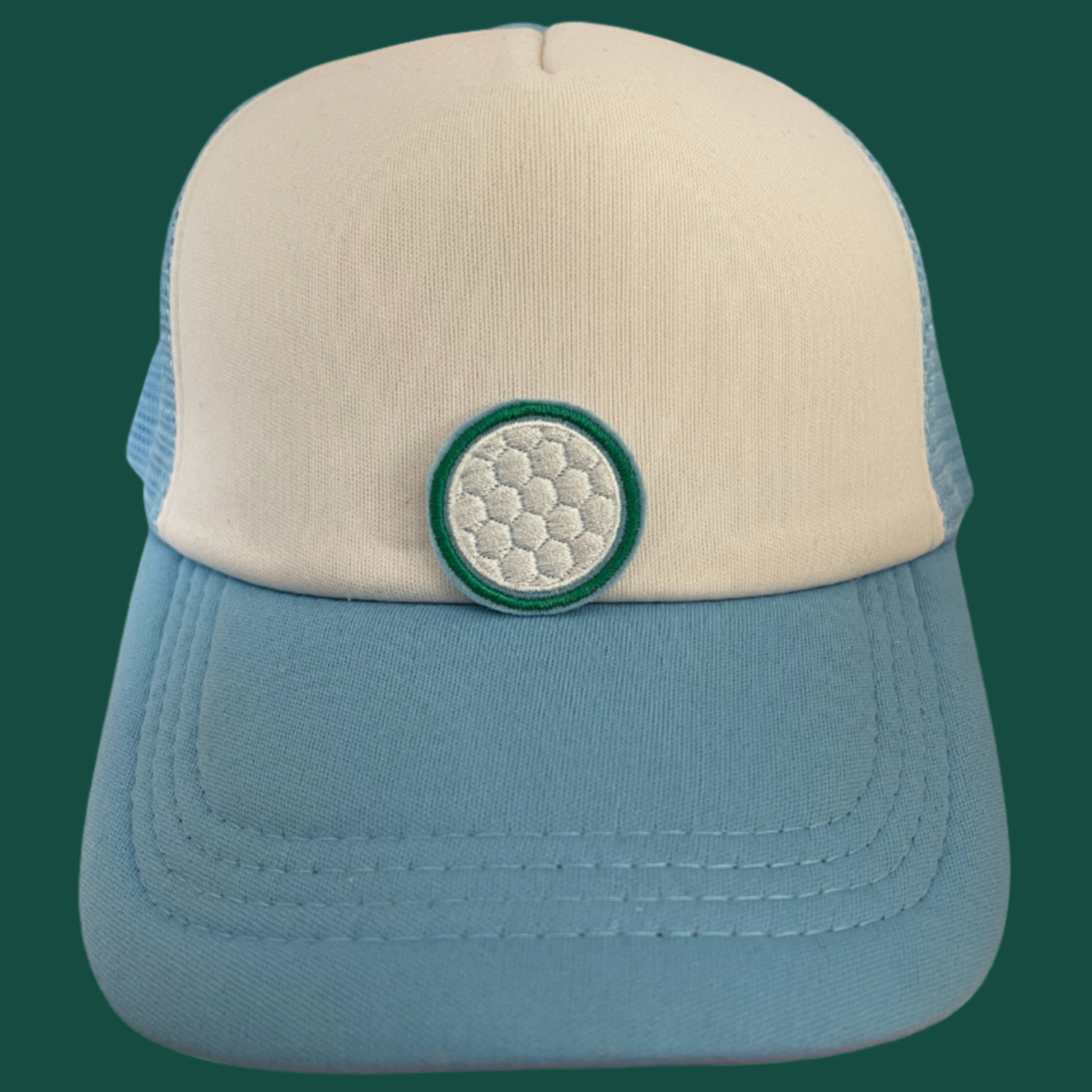 Golf ball iron-on patch in green and white embroidery, perfect for adding a sporty touch to your clothing or accessories, and ideal for customization.