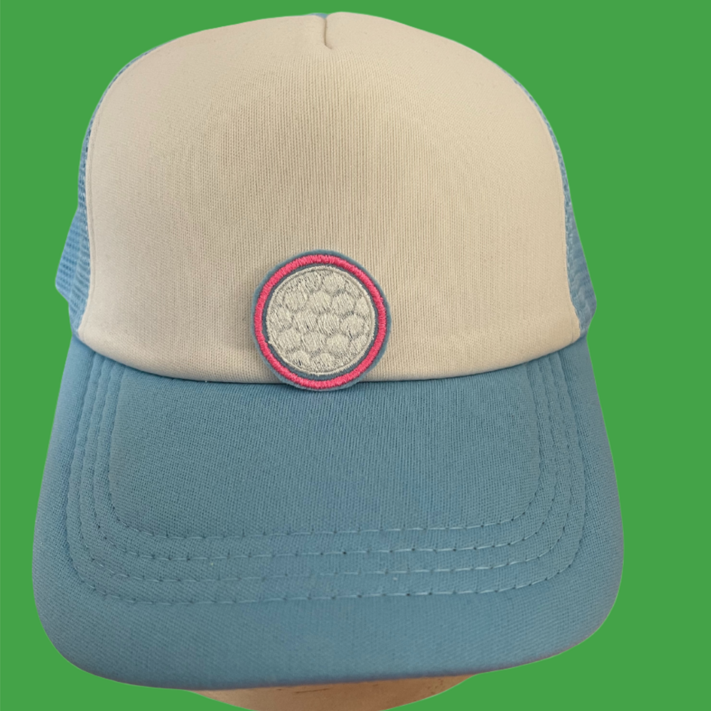 Golf ball iron-on patch in pink and blue embroidery, perfect for adding a sporty touch to your clothing or accessories, and ideal for customization.