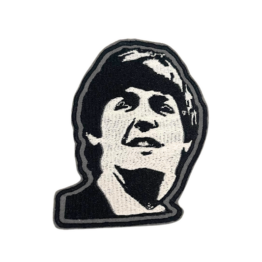 Handmade Paul McCartney patch with intricate black and white embroidery.