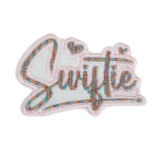 Handmade Swiftie patch with sparkling embroidery and heart accents.