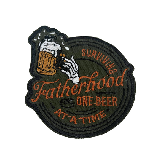 Handmade "Surviving Fatherhood One Beer at a Time" patch featuring a beer mug design.