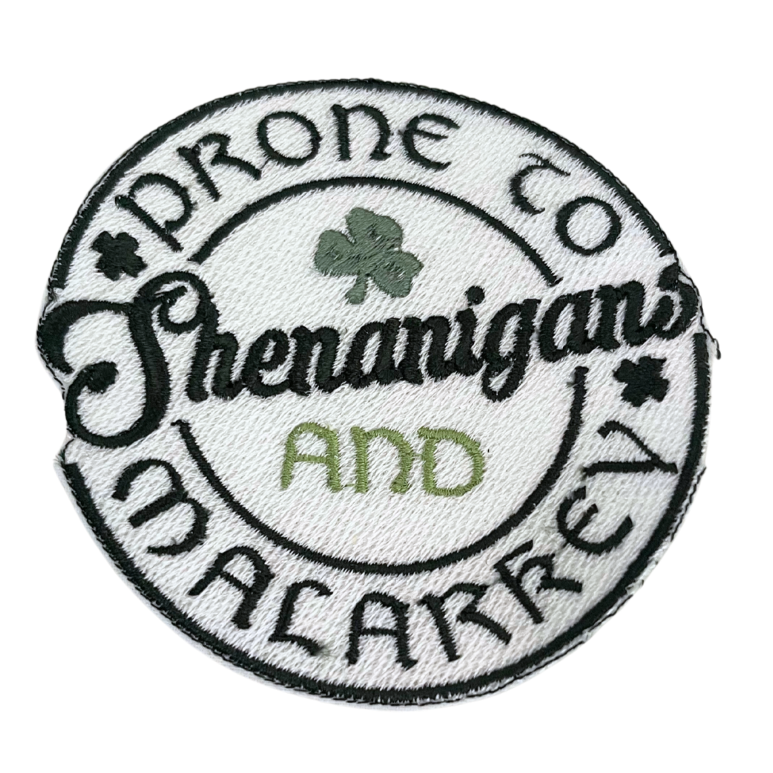 Handmade "Prone to Shenanigans and Malarkey" patch with green clover and playful design.