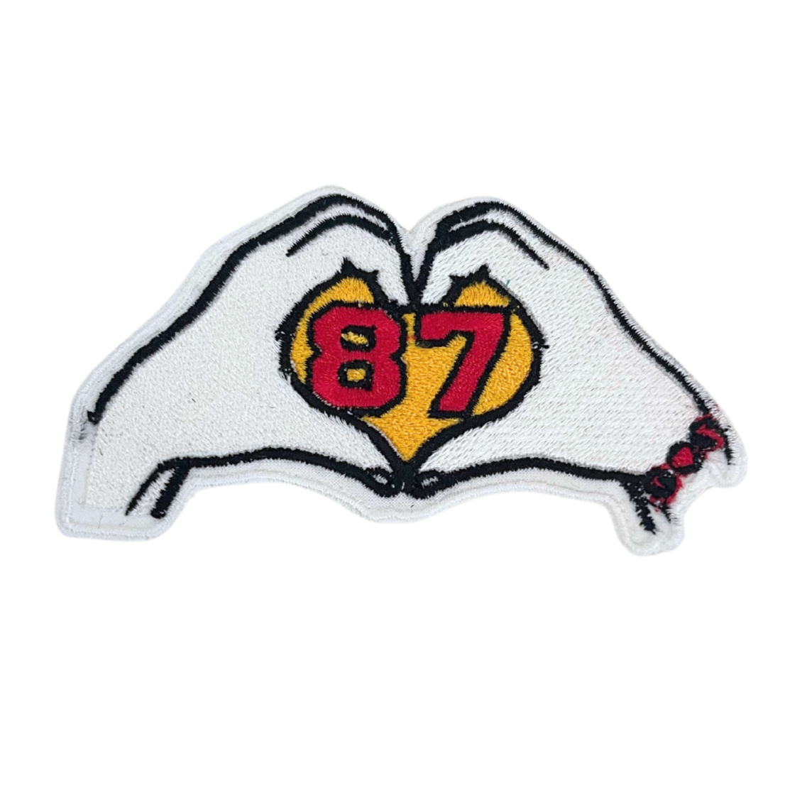 Handmade Travis Kelce and Taylor Swift patch featuring number 87 within heart-shaped hands.