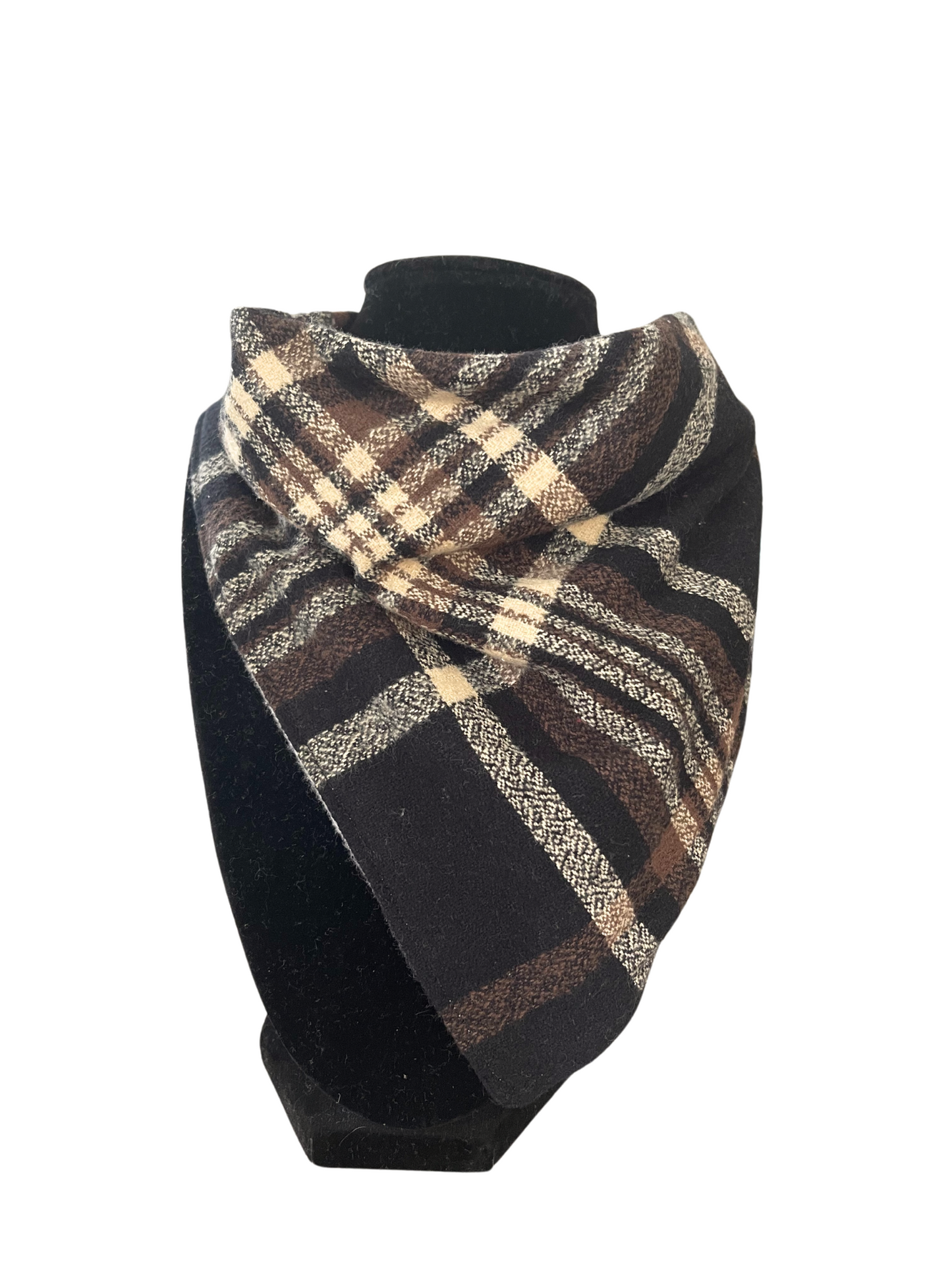 Reversible bib-dana with a brown, cream, and black plaid pattern on one side and solid color cotton flannel on the reverse, displayed on a black mannequin.