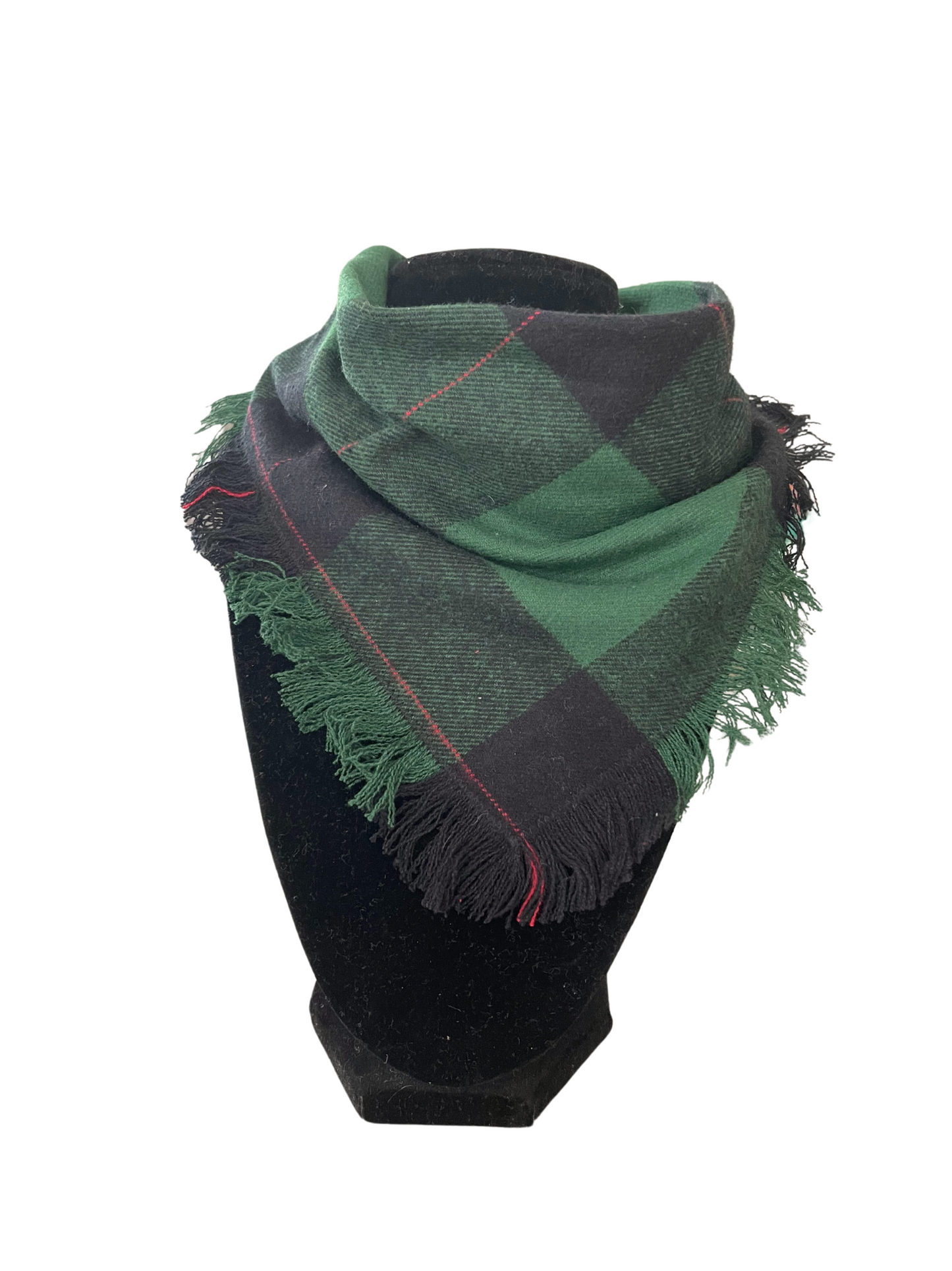 Classic green and black plaid fringe bib-dana scarf for babies and toddlers on display.