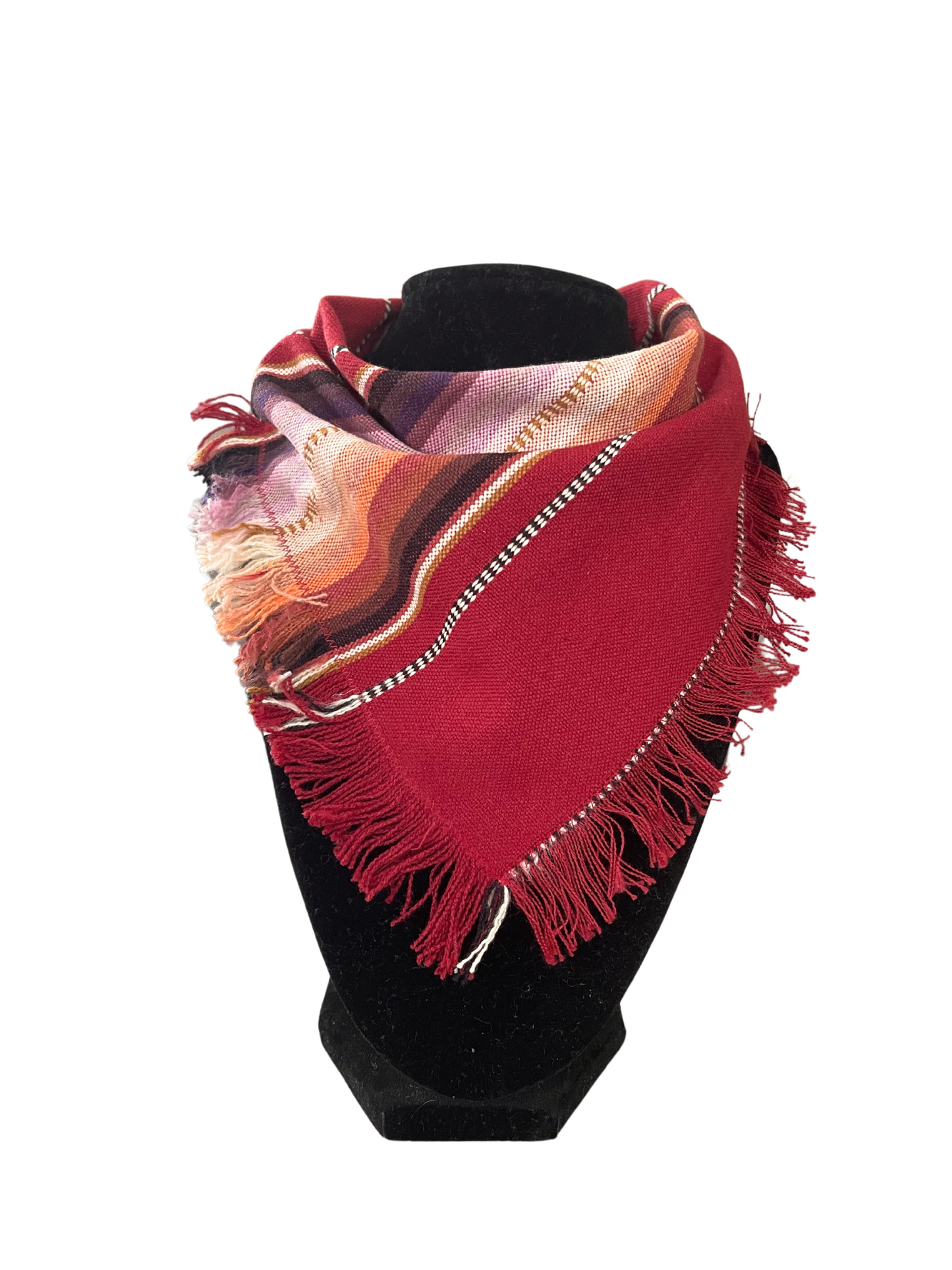 Vibrant red fringe bib-dana scarf for babies and toddlers with colorful pattern and adjustable snap closure.