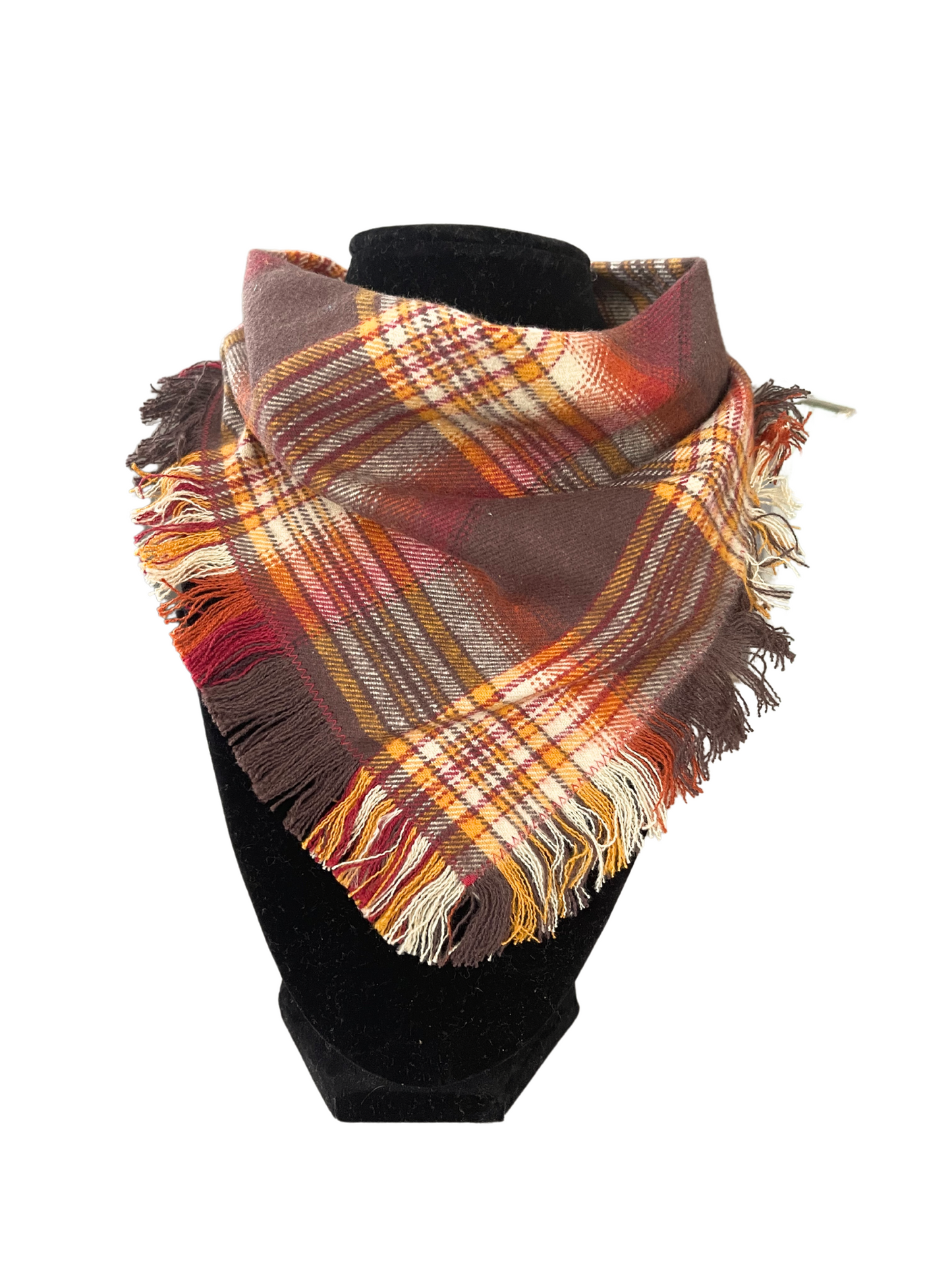 Rustic autumn plaid fringe bib-dana scarf for babies and toddlers on a display stand.