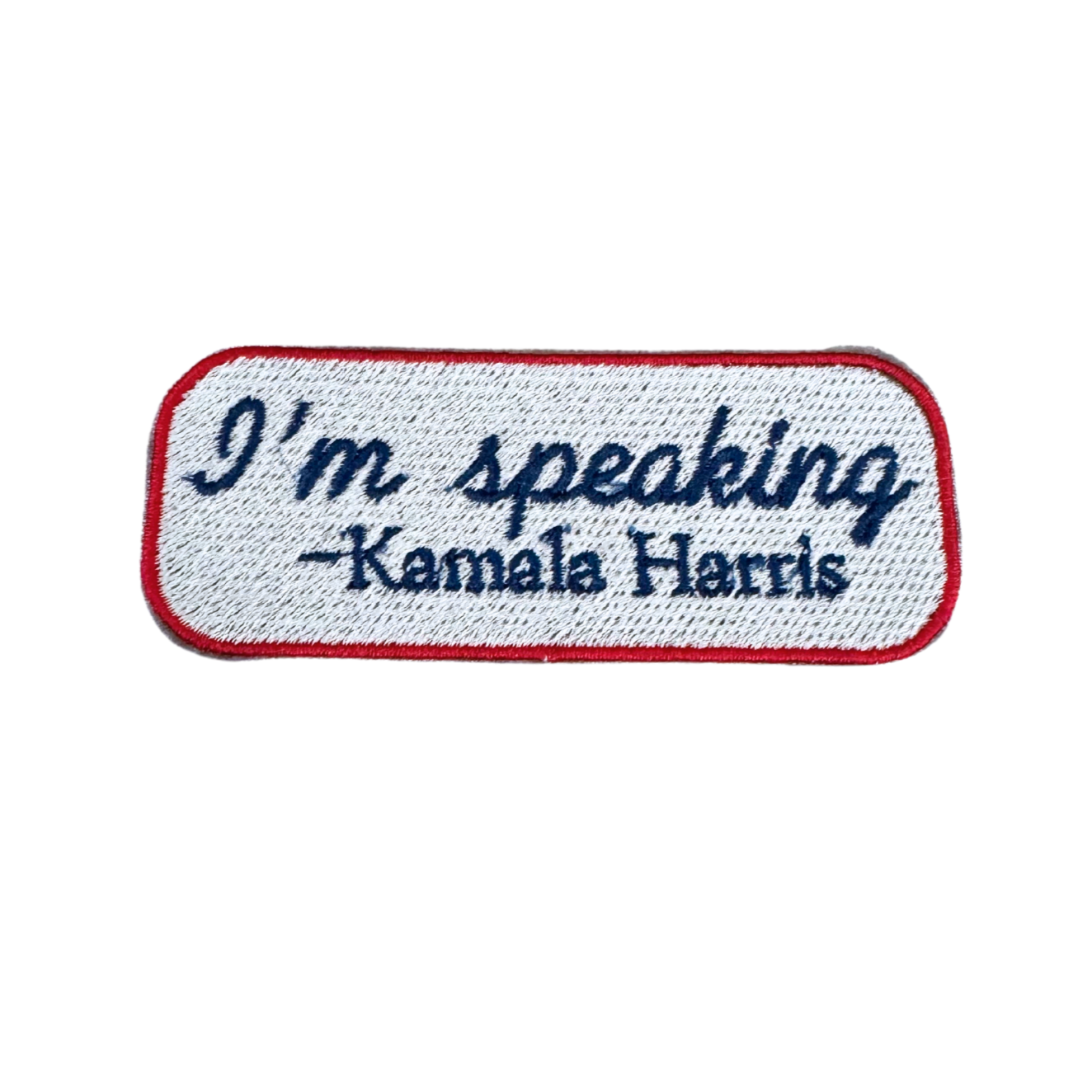 Handmade "I'm Speaking" Kamala Harris patch in white with blue and red embroidery.