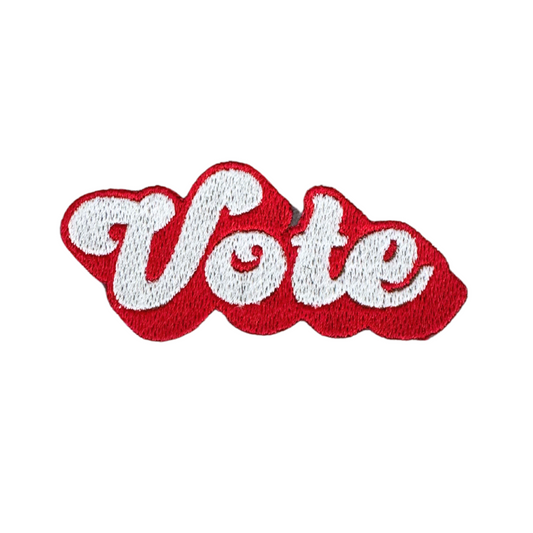 Handmade "Vote" patch in red and white with a bold, stylish design.