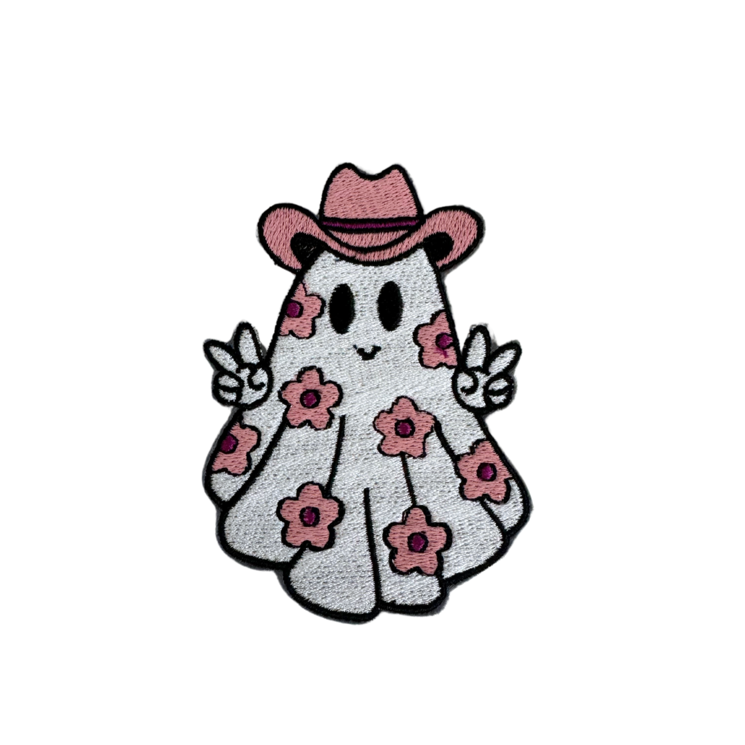 Pink Cowboy Ghost patch with floral print and peace sign.

