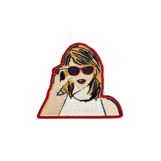 Taylor Swift patch with red sunglasses design.

