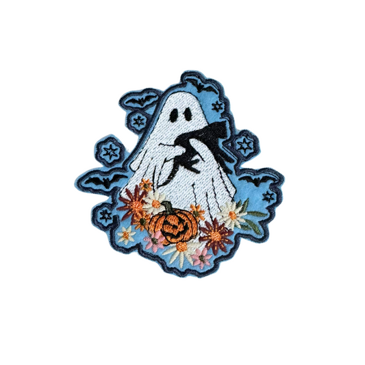 Ghost patch with floral details and a pumpkin, perfect for Halloween.

