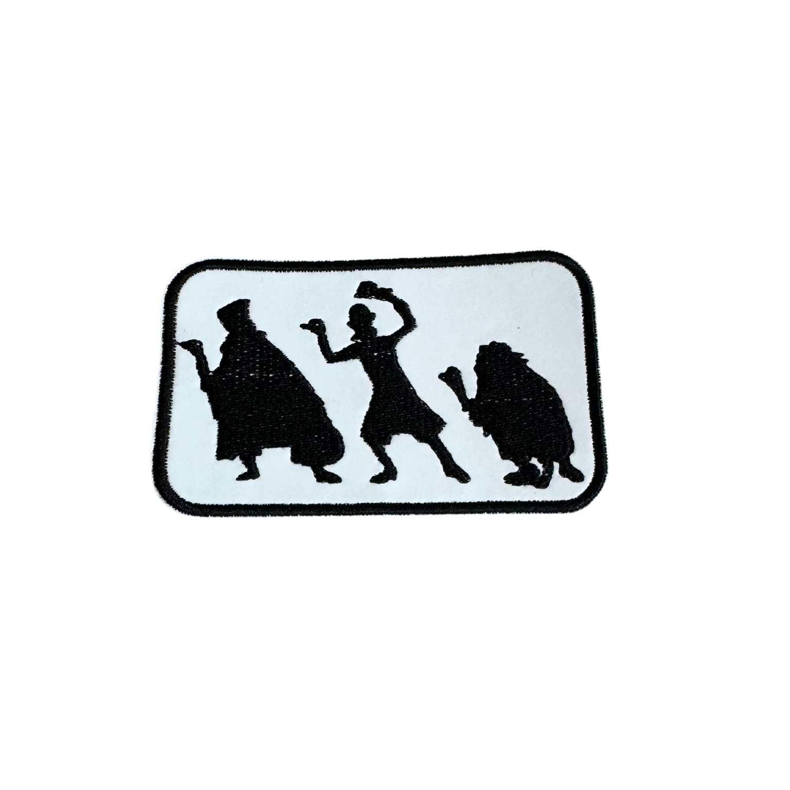 Glow in the dark Hitchhiking Ghosts patch in black and white.

