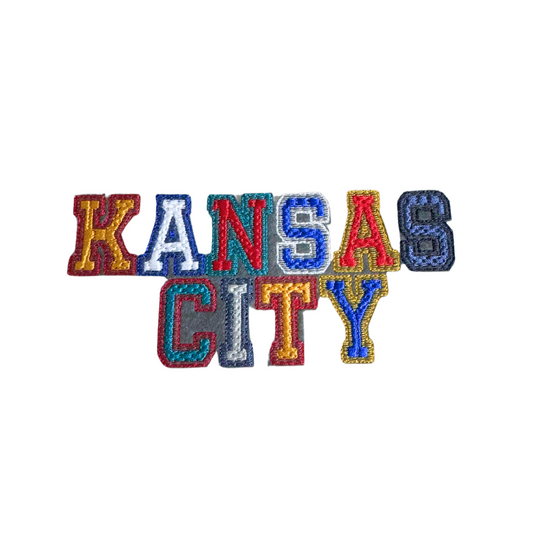 Retro Kansas City patch with multicolored vintage lettering.

