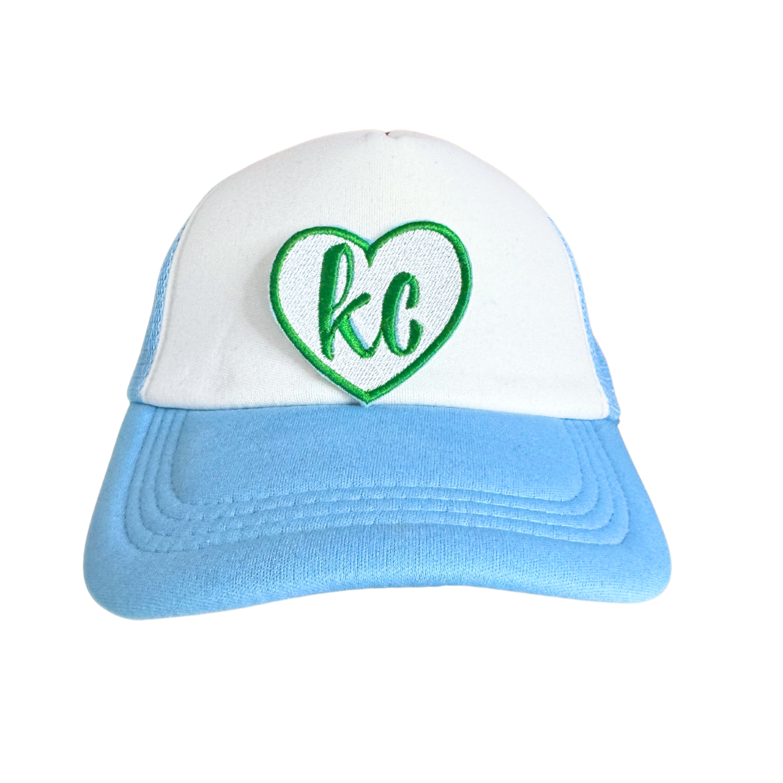 Green heart patch with "KC" in white lettering.

