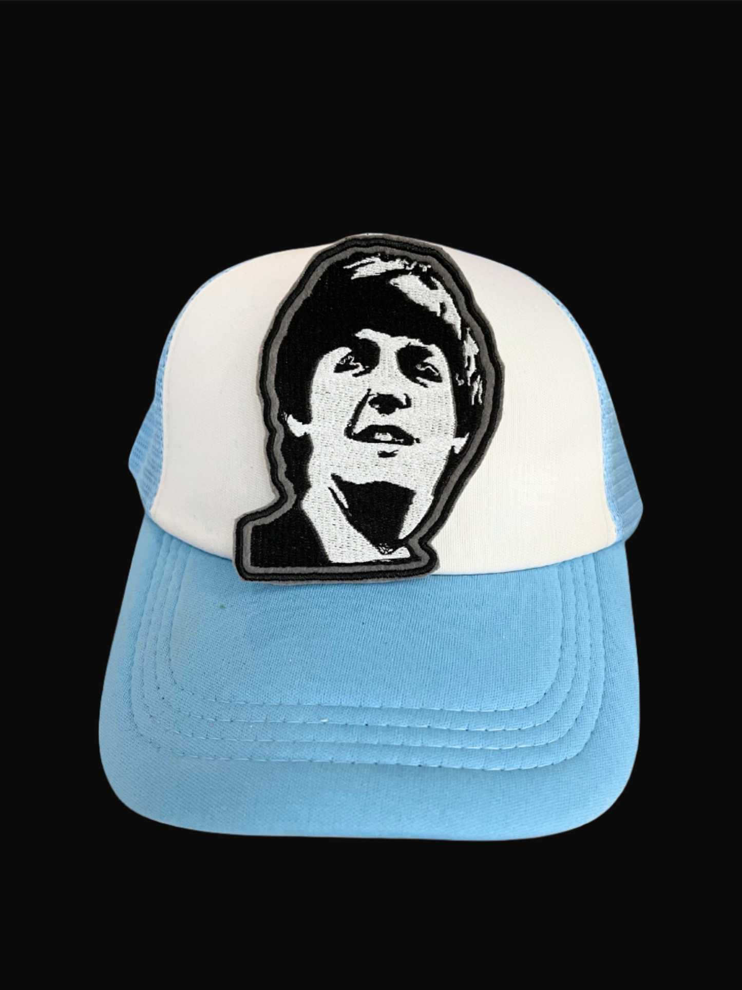 Handmade Paul McCartney patch with intricate black and white embroidery.