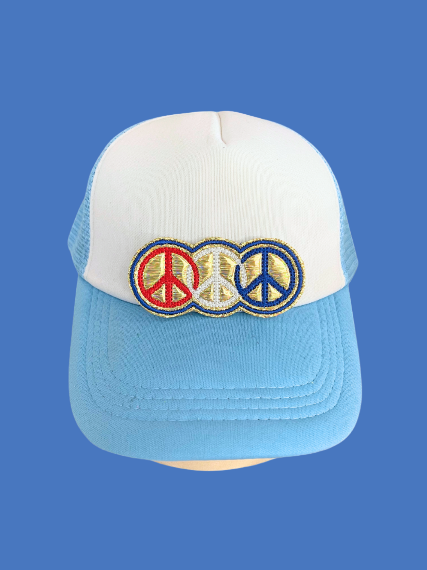 Handmade Peace Sign patch with red, white, and blue symbols on a white background.