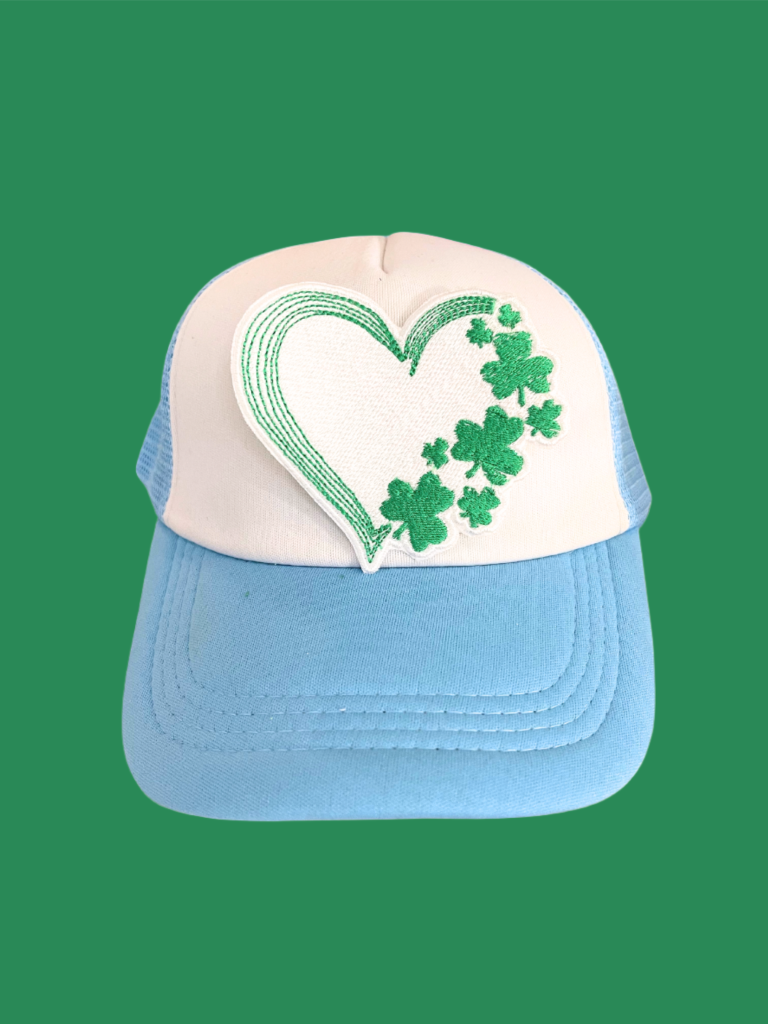 Handmade Shamrock Heart patch with green clovers and intricate embroidery.