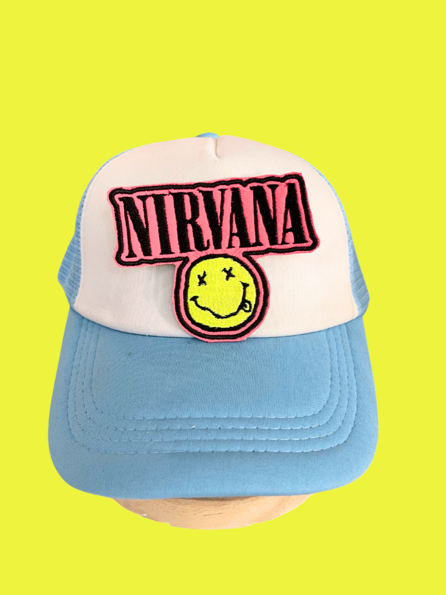 Handmade Nirvana Smiley Face patch with vibrant colors and intricate embroidery.