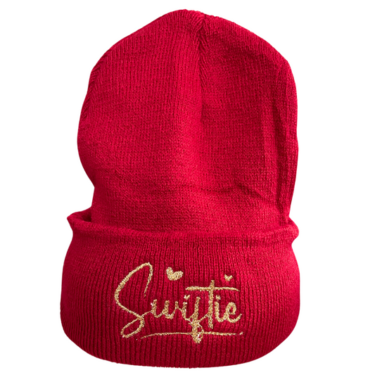 Gold embroidered "Swiftie" on red beanie