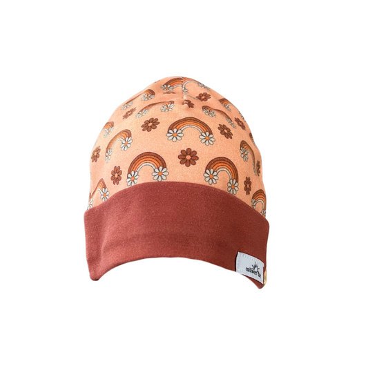 Organic cotton baby beanie with vintage rainbow and flower pattern, rust cuff, handmade in Kansas City.