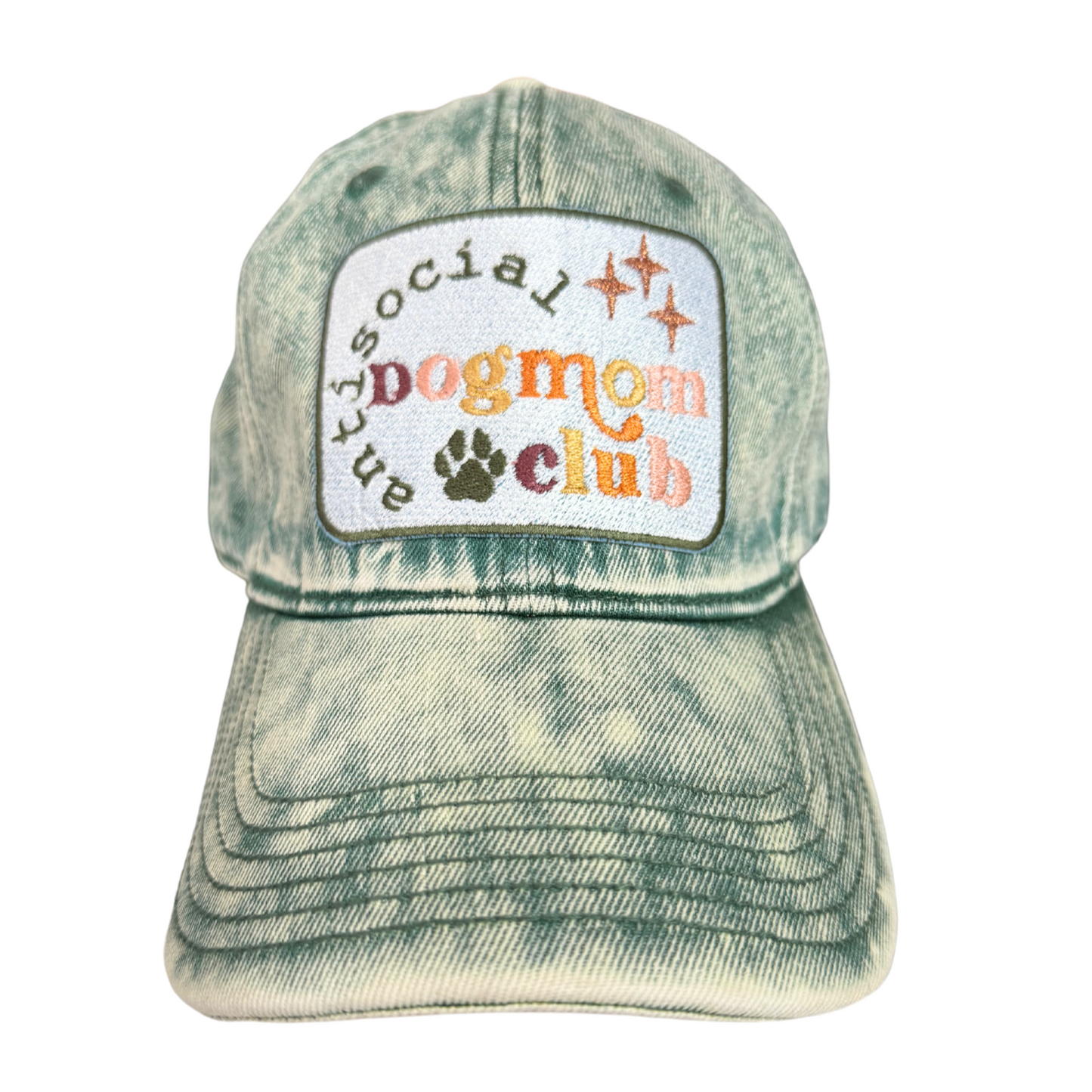 "Anti-Social Dog Mom Club" embroidered patch on a distressed green hat.

