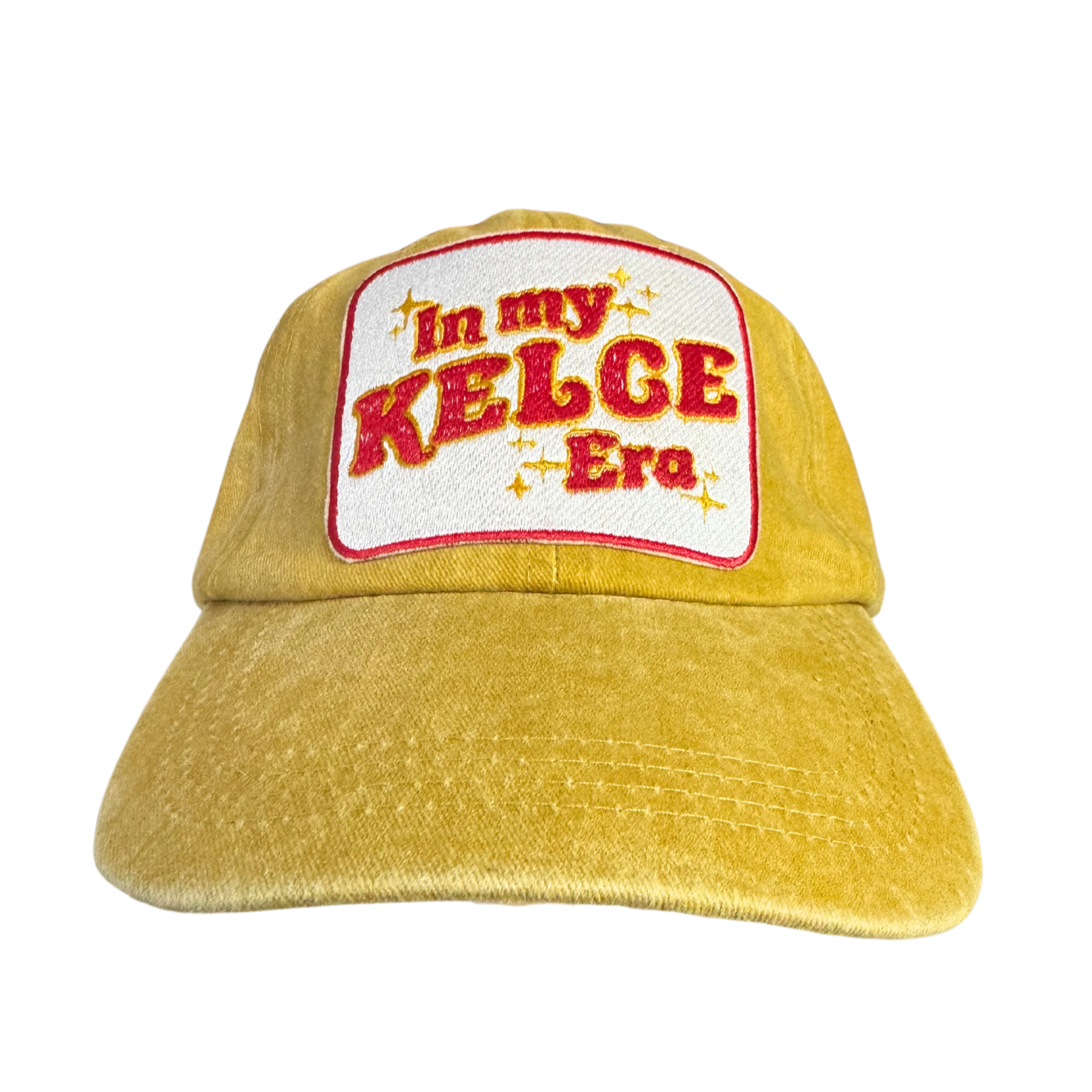 "In My Kelce Era" embroidered patch on a mustard yellow hat.

