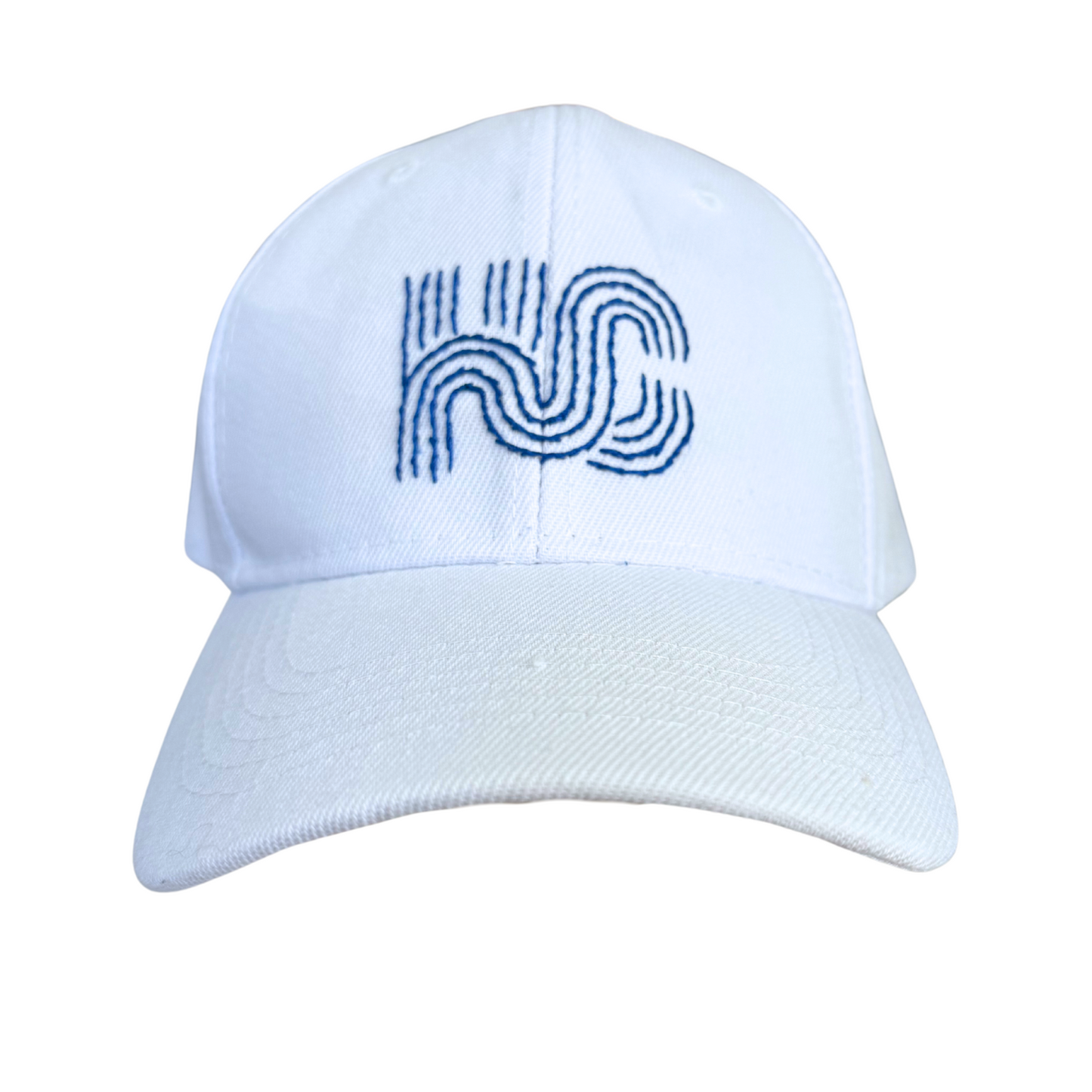 White KC hat with hand-embroidered blue KC logo in Royals colors, made in Kansas City