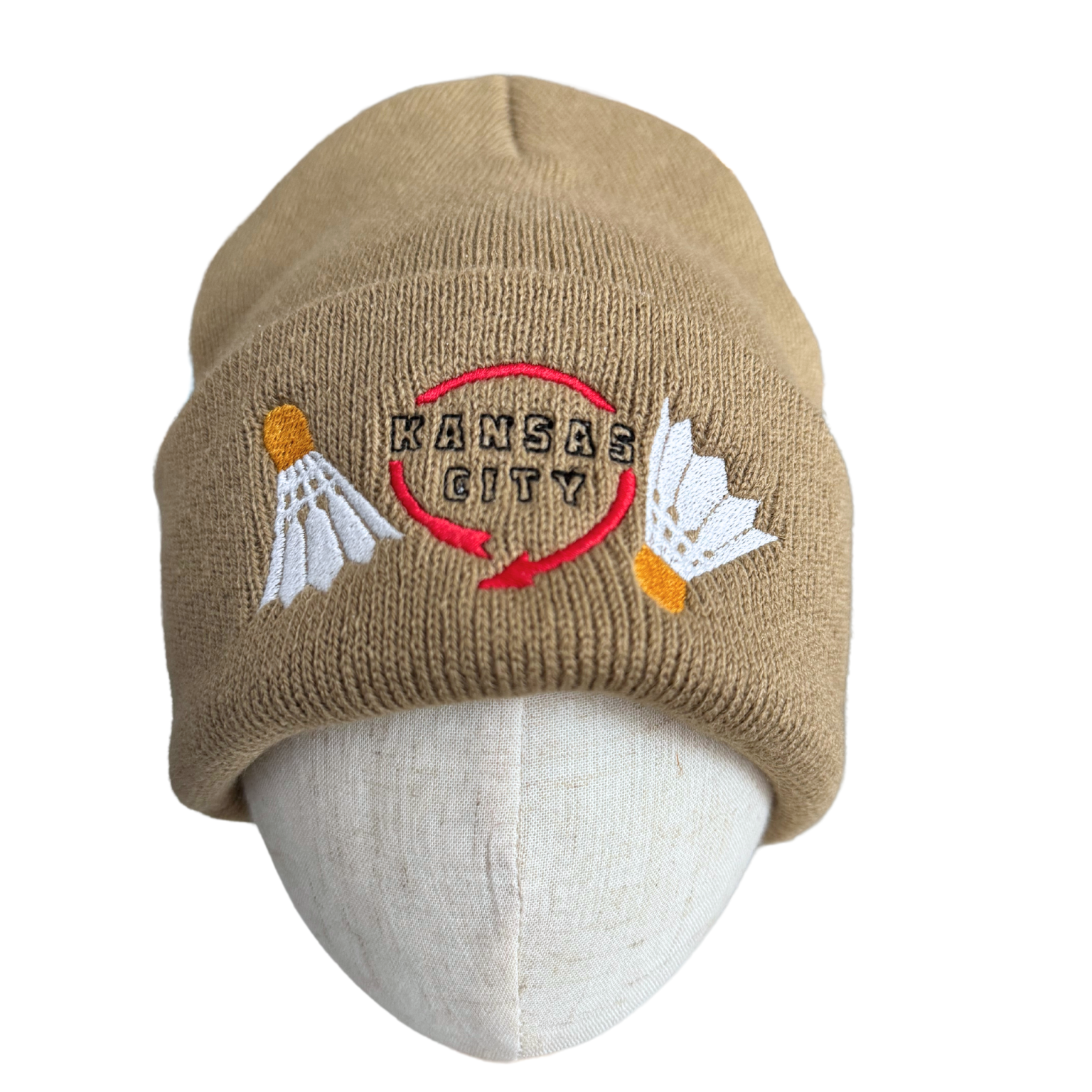 Khaki beanie with embroidered Kansas City shuttlecock sculptures and Western Auto-inspired design.

