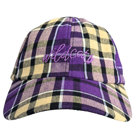 Hand-embroidered "Wildcats" design on purple and yellow plaid hat.

