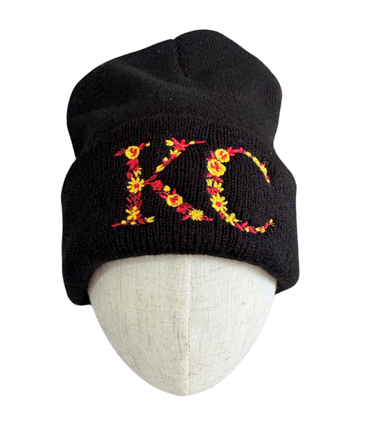 Black beanie with floral "KC" embroidery in red and yellow, adult size, Chiefs-inspired Kansas City hat.

