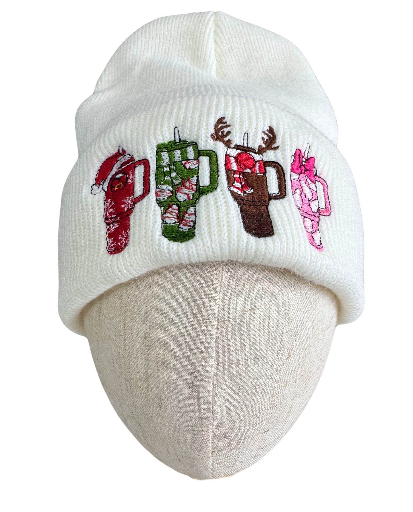 Holiday Stanley Cups Embroidered Beanie with festive designs, including Santa hat, reindeer antlers, candy canes, and marshmallows.