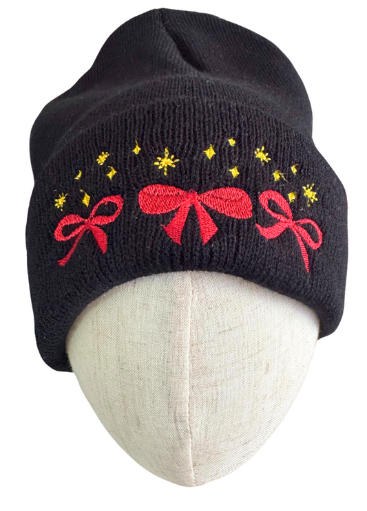 Embroidered black beanie with red bows and golden stars for Chiefs fans.